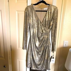 Calvin Klein gold dress.